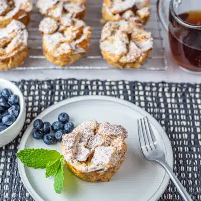 Square image of baked French toast muffins.