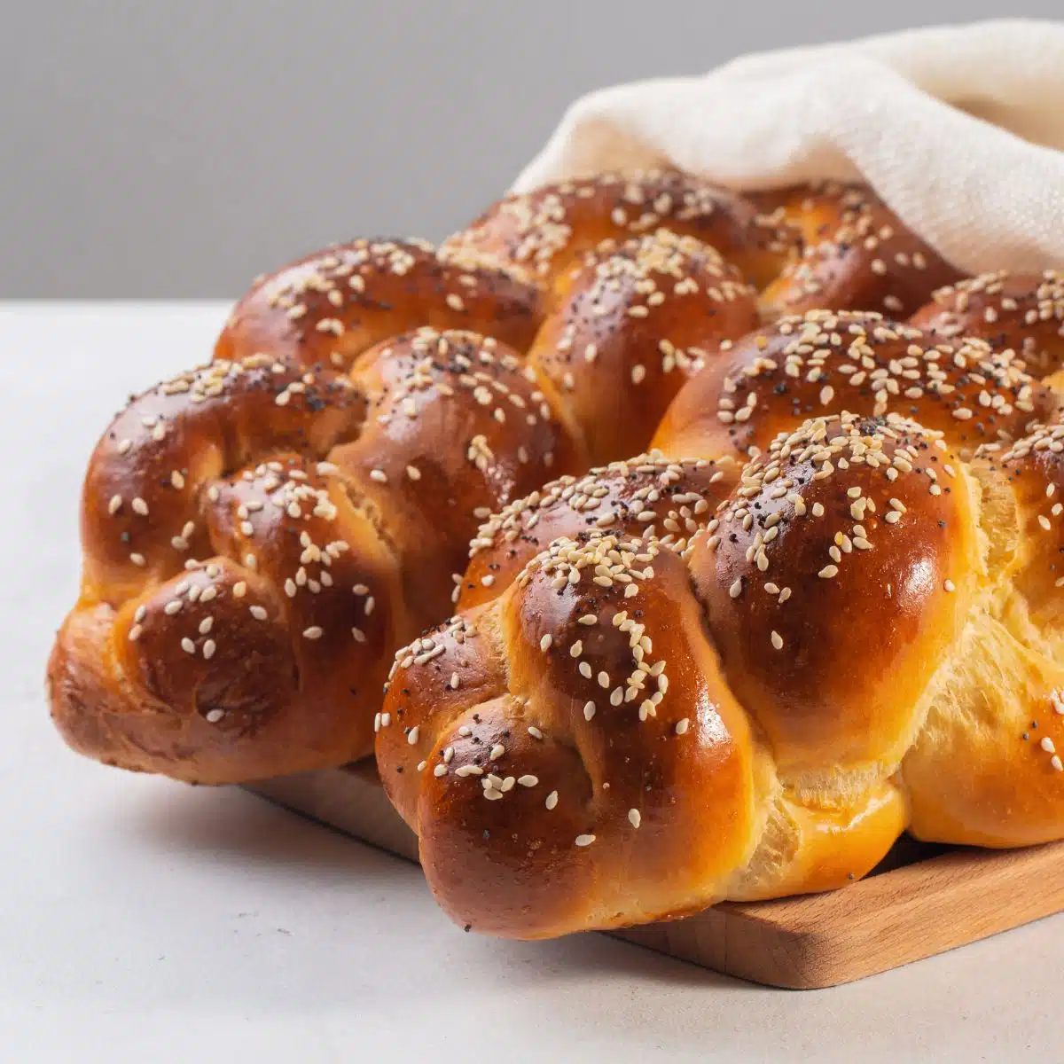 Square image of challah bread.