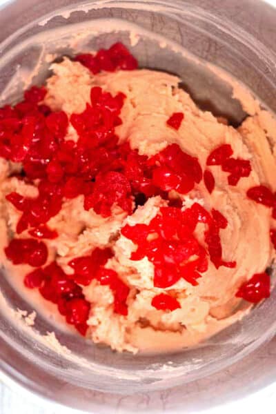 Process image 6 showing cookie dough with cherries.
