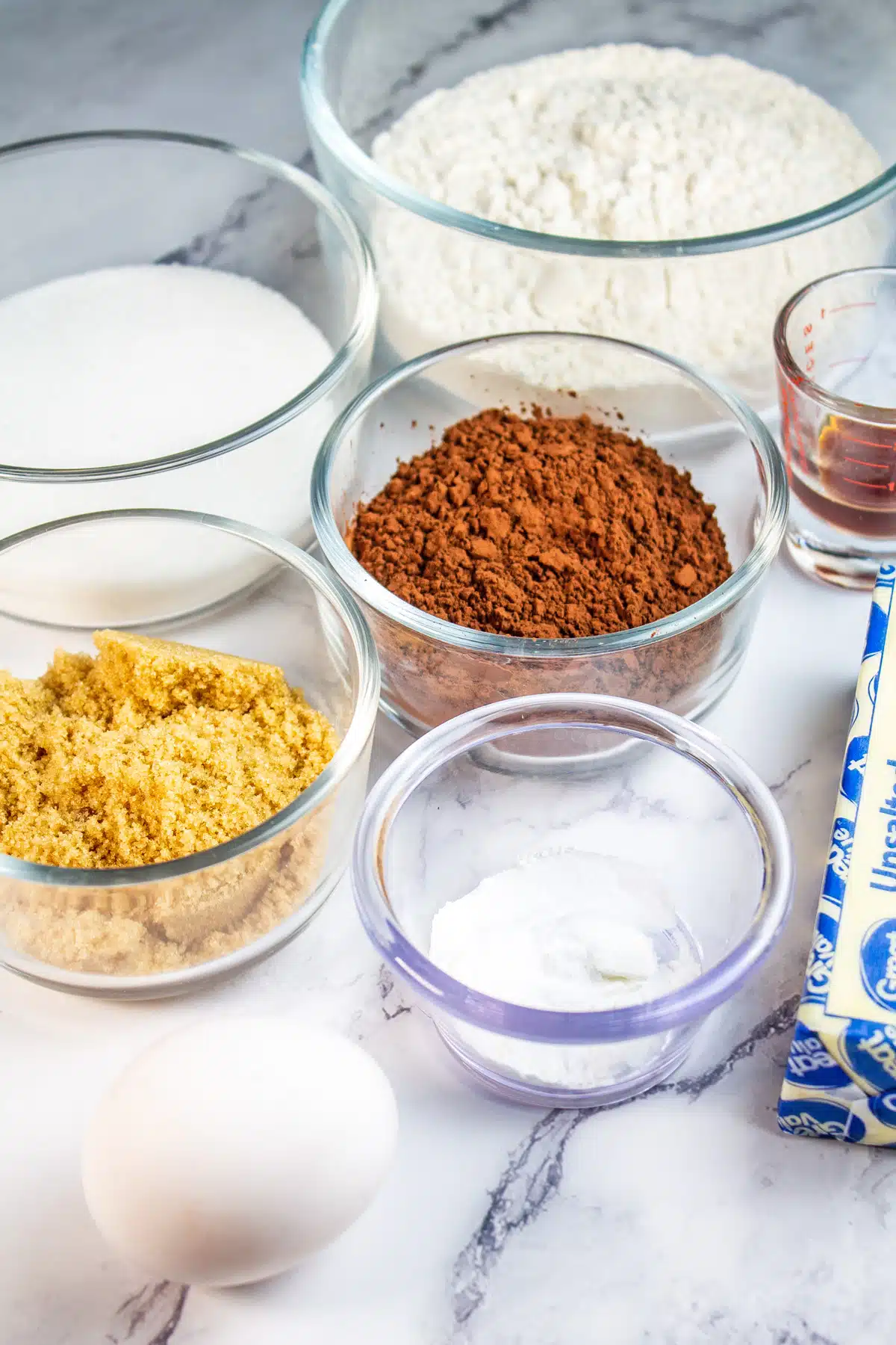 Tall image showing ingredients needed for chocolate cookies.