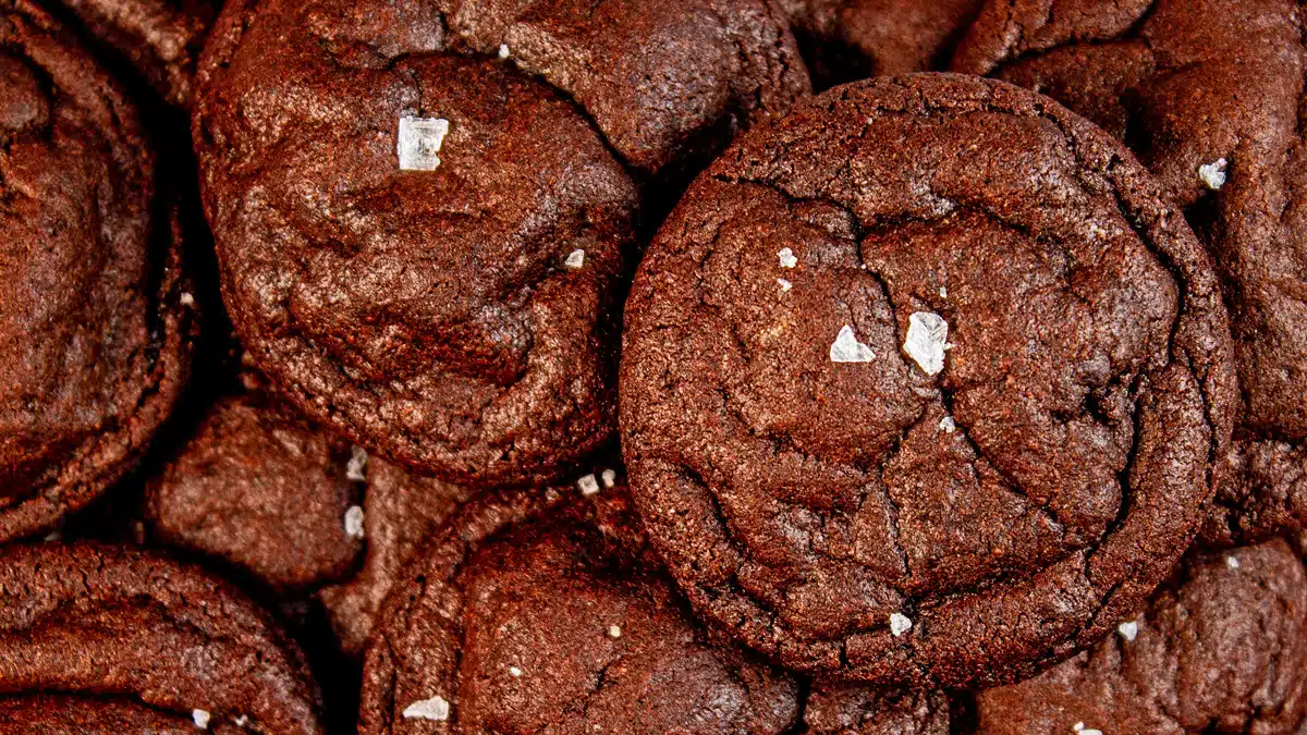 Wide overhead image of chocolate cookies.