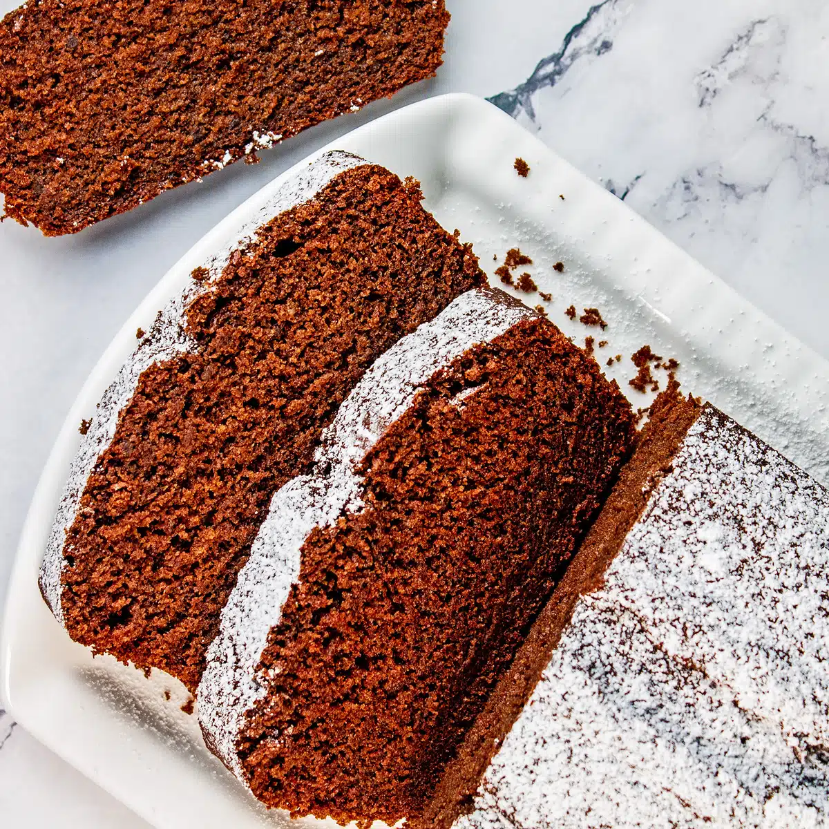 Square image of chocolate loaf cake.