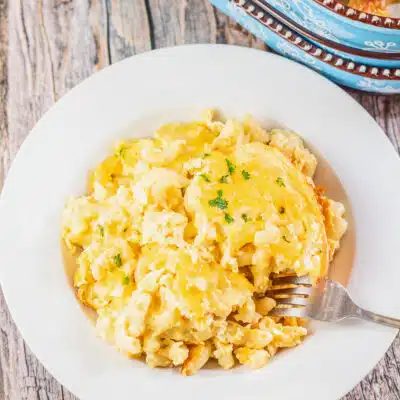 Best Paula Deen's Macaroni and Cheese recipe with lots of cheese, eggs, sour cream, and baked to perfection.
