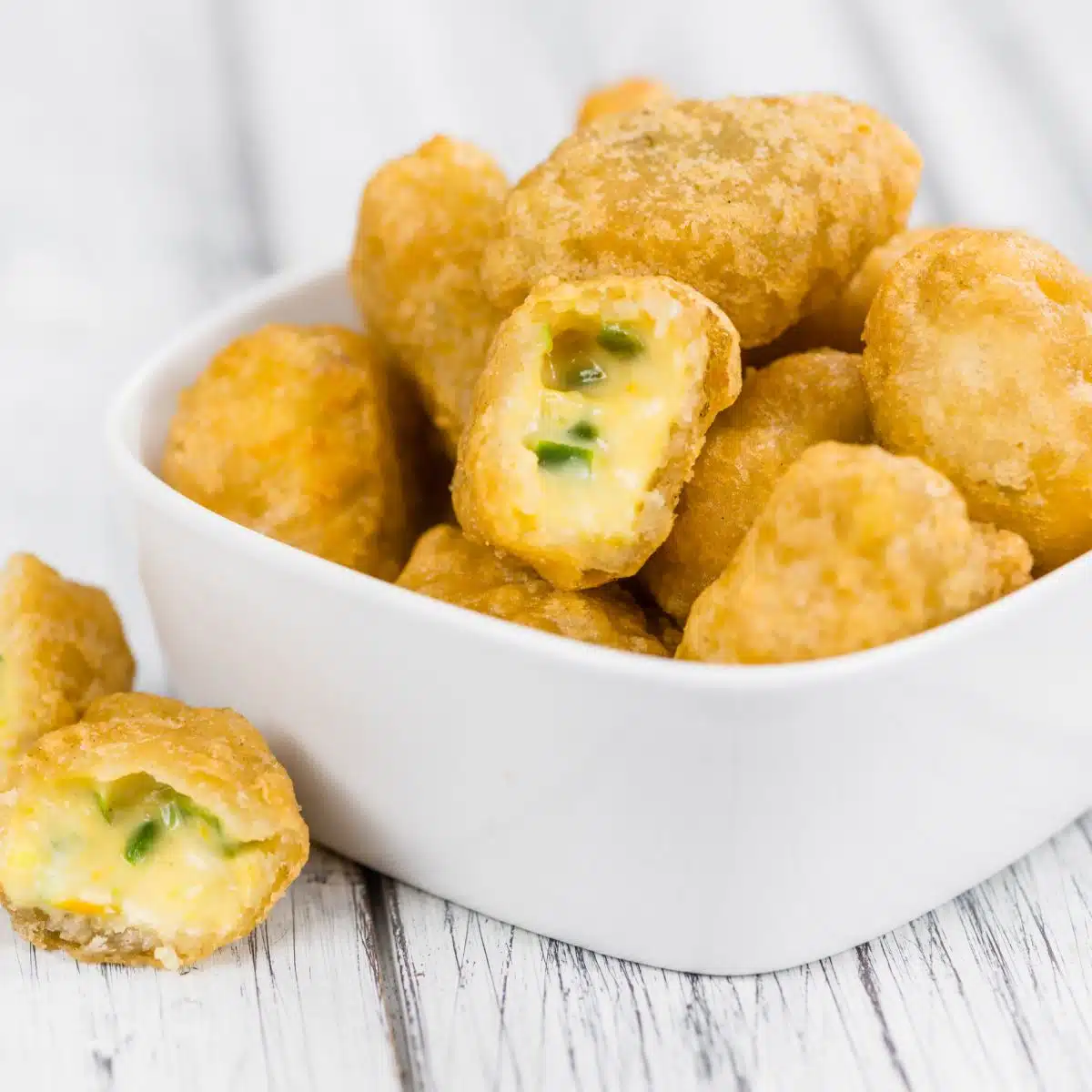 Square image of air fryer chili cheese nuggets.