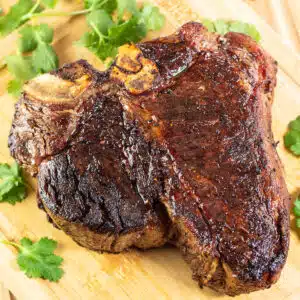 Square image of Bistecca alla Fiorentina.