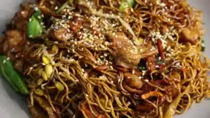 Wide image of Cantonese chow mein.