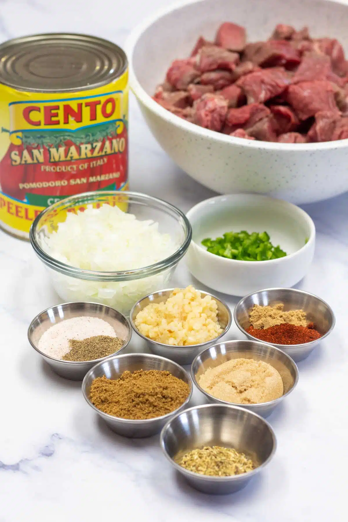 Carne picada meat ingredients measured out and ready to combine.