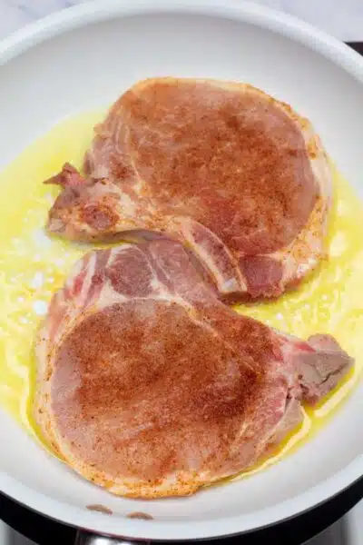 Process image 2 showing searing pork chops.