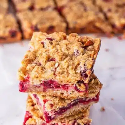 Tall image of cranberry crumble bars.