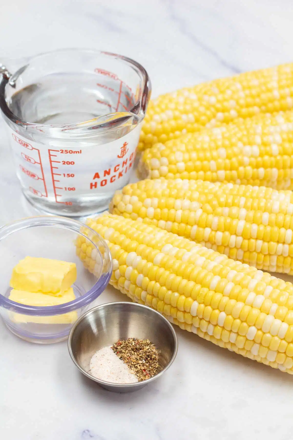 Tall ingredient image for instant pot corn on the cob.