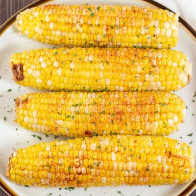 Square image of instant pot corn on the cob.