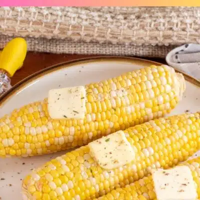 Pin image with text of microwaved corn on the cob.