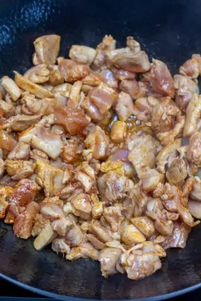 Process image 4 showing cooked chicken in wok.