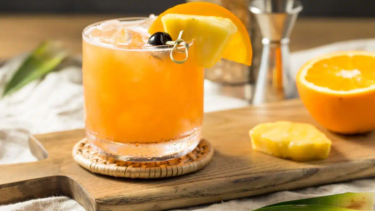 Wide image of a rum runner cocktail.