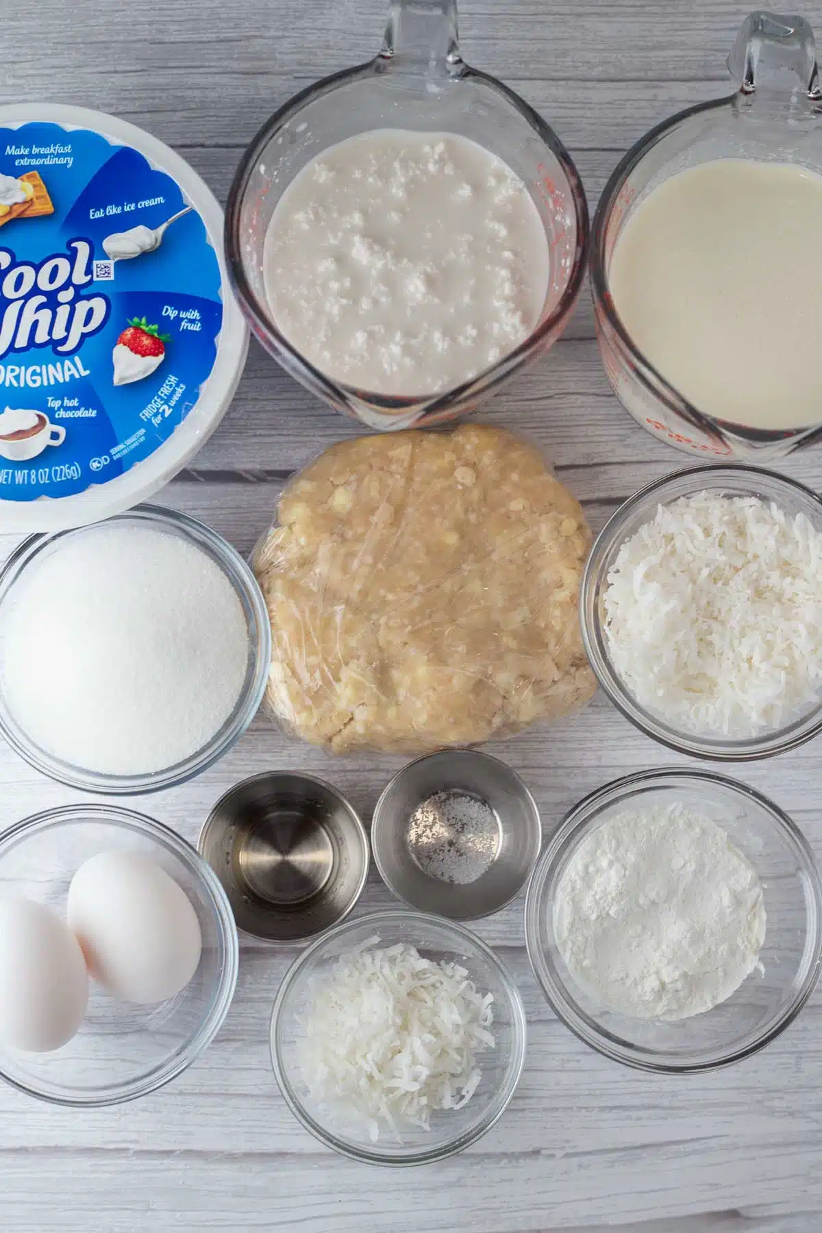 Tall image of coconut cream pie ingredients.
