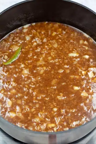 Process image 6 showing seasoning combined and cooking.