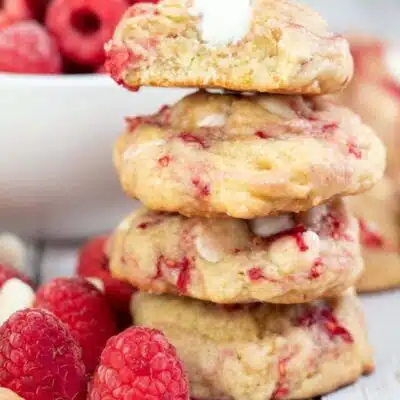 Tall image of raspberry white chocolate cookies.