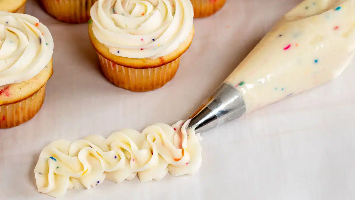 Wide image of homemade funfetti buttercream frosting.