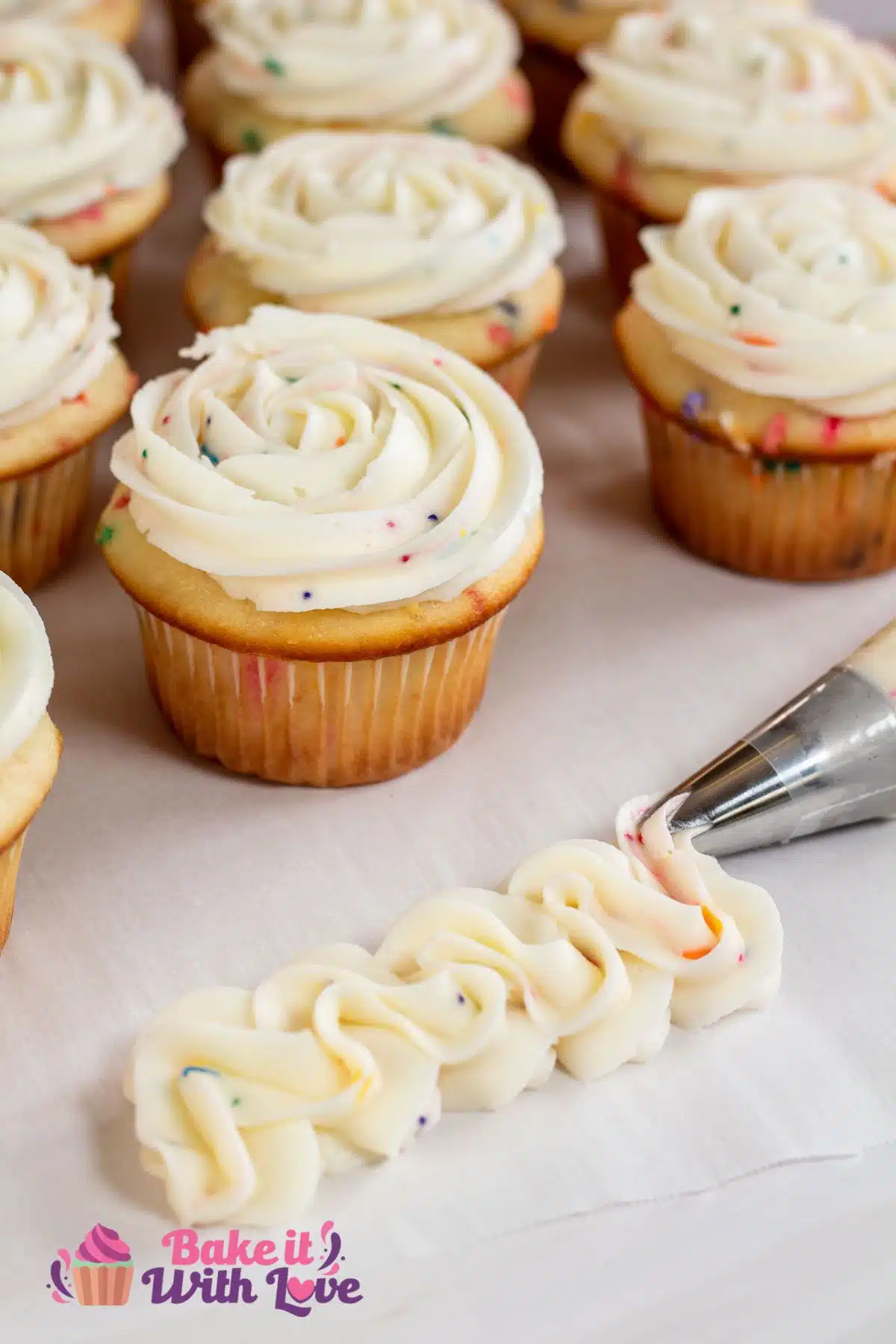Tall image of homemade funfetti buttercream frosting.