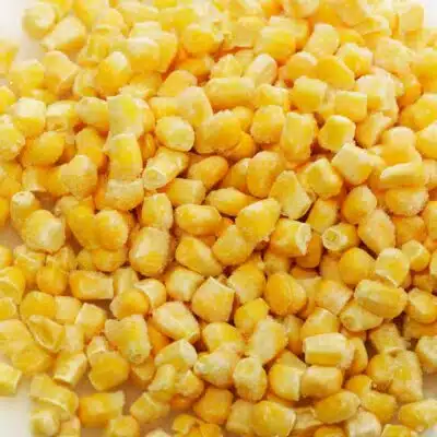 Square image of frozen corn.