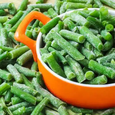 Square image showing frozen green beans.