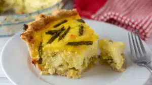 Wide image of asparagus quiche.