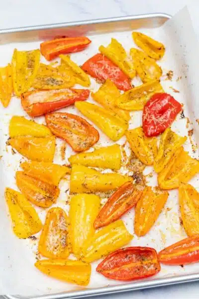 Process image 4 showing roasted mini peppers on baking sheet.