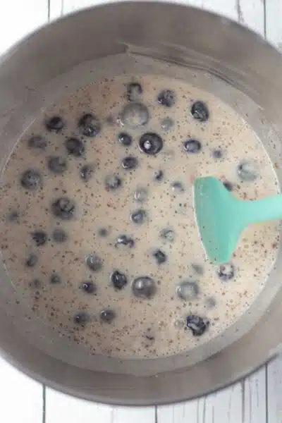 Process image 5 showing making filling, added blueberries.