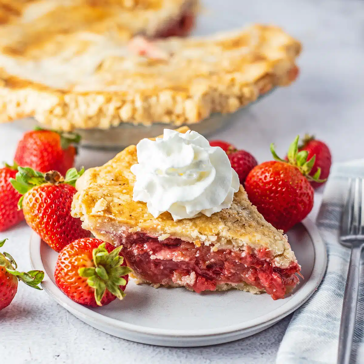 Square image of strawberry rhubarb pie.