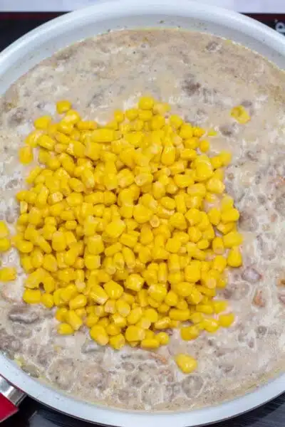 Process image 3 showing adding corn.