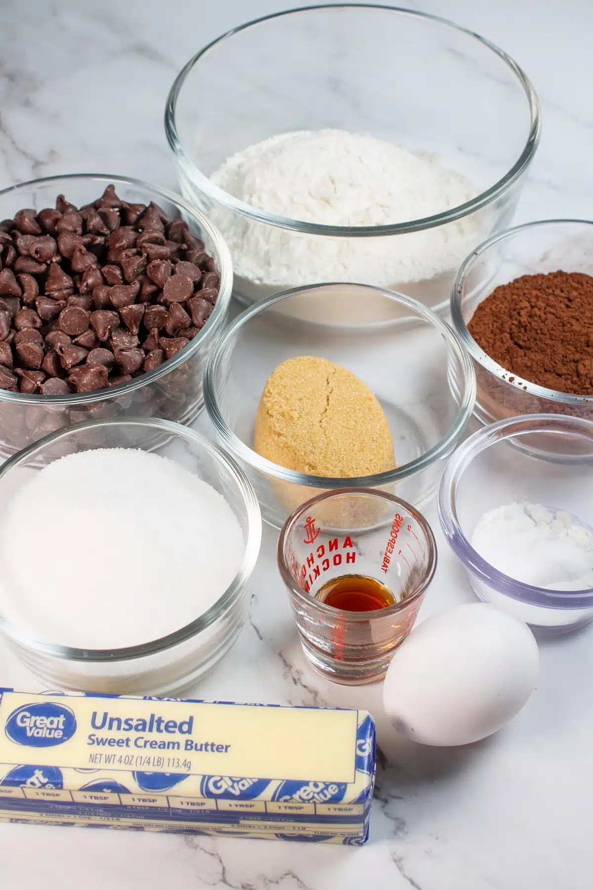 Tall image of double chocolate chip cookie ingredients.