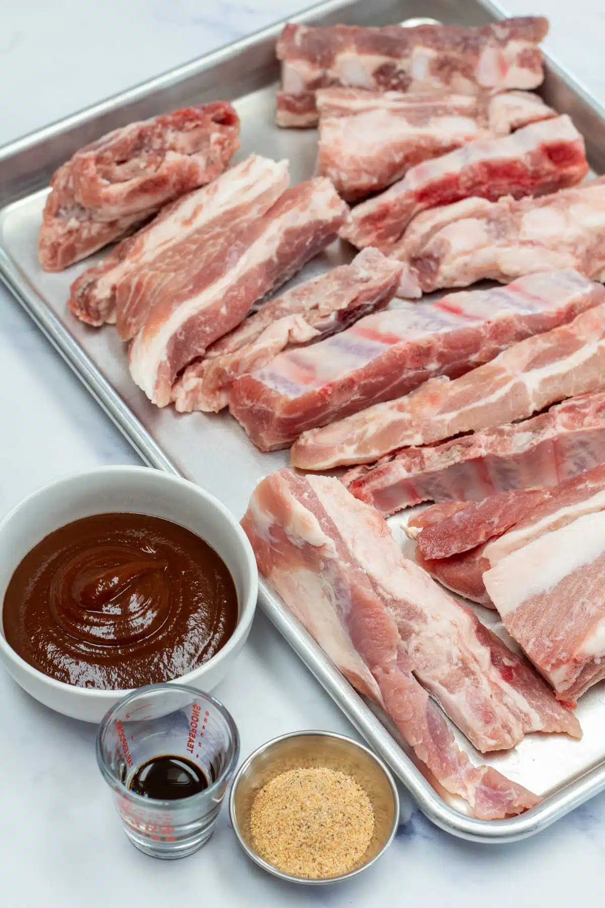 Tall image of bbq grilled pork tip ingredients.