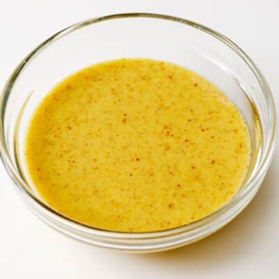Square image of honey mustard vinaigrette.