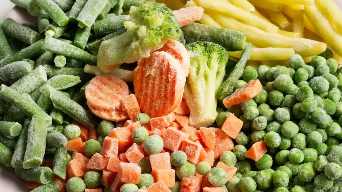 Wide image of frozen mixed vegetables.