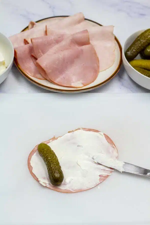Process image showing rolling up a pickle in cream cheese covered ham.