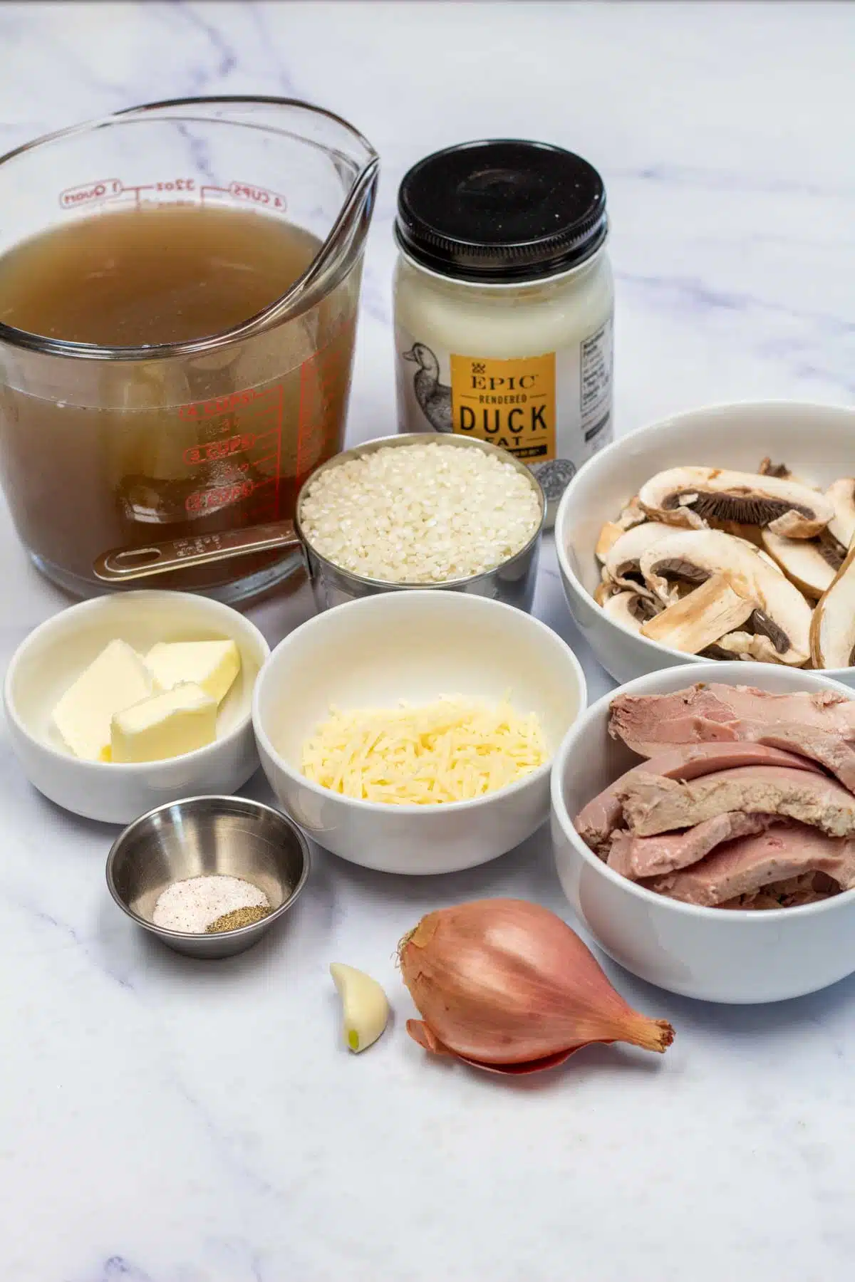 Tall image showing smoked duck risotto ingredients.