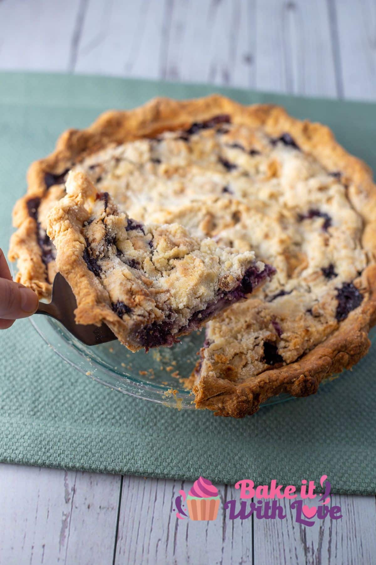 Tall image of sour cream blueberry pie.
