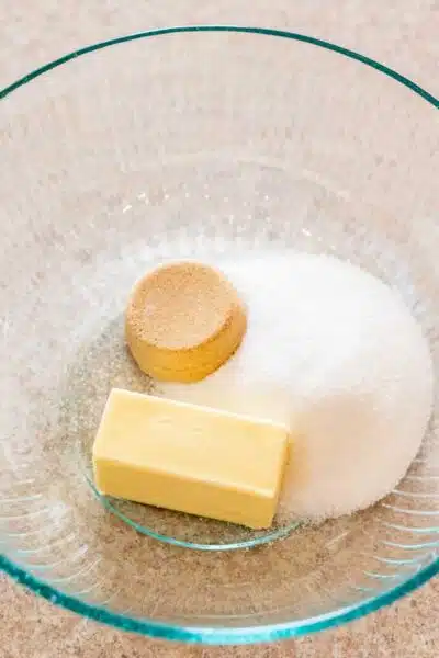 Process image 1 showing butter and sugars in a mixing bowl.