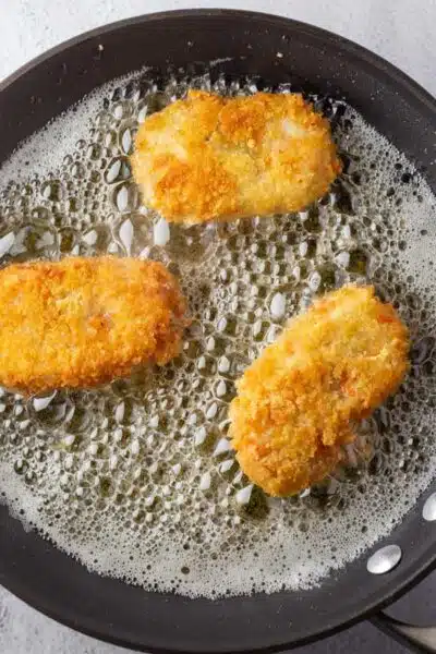 Process image 11 showing frying croquettes.