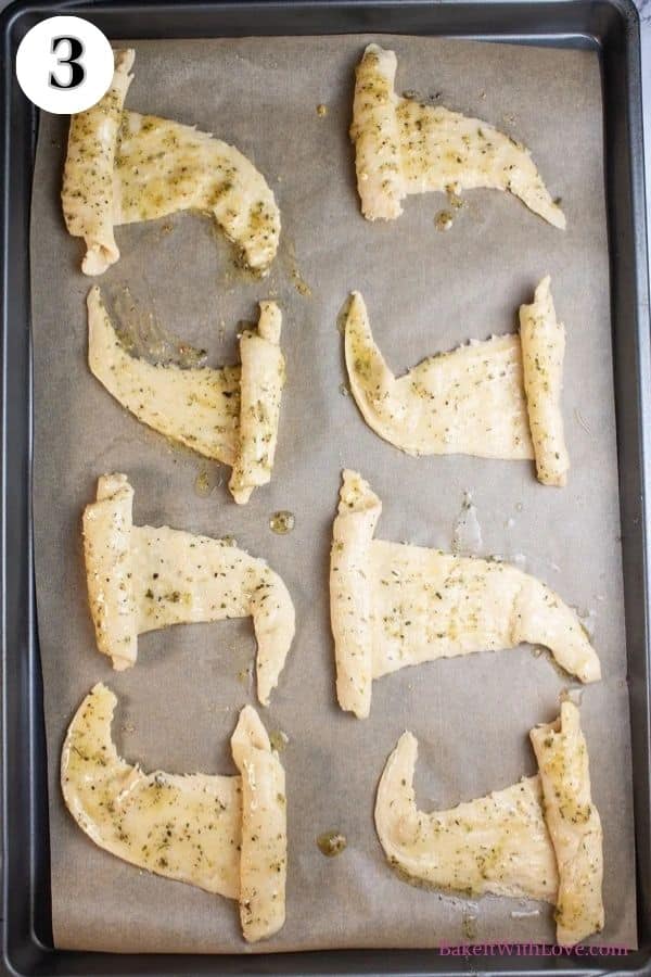 Halloween crescent roll witches hats process photo 3 showing the crescent roll hats brushed with melted butter and seasonings.