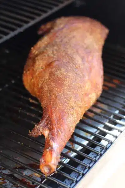 Process image 4 showing lamb leg finished in smoker.