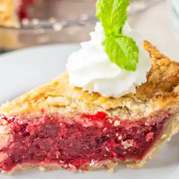 Wide image of raspberry pie slice.