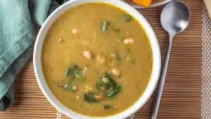 Wide image of sopa de legumes (Portuguese vegetable soup).
