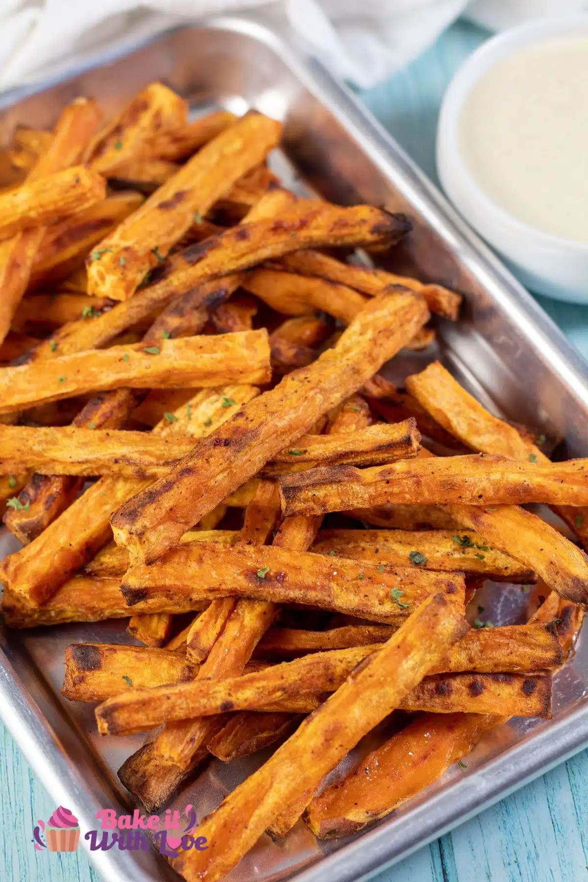 Tall image showing sweet potato fries.
