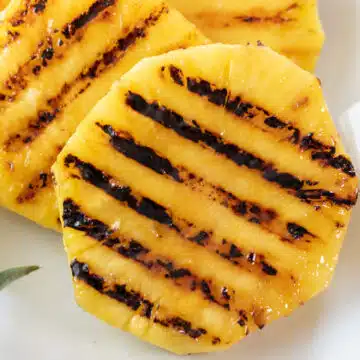 Wide image of grilled pineapple.