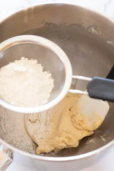 Process image 2 showing sifting cake flour.