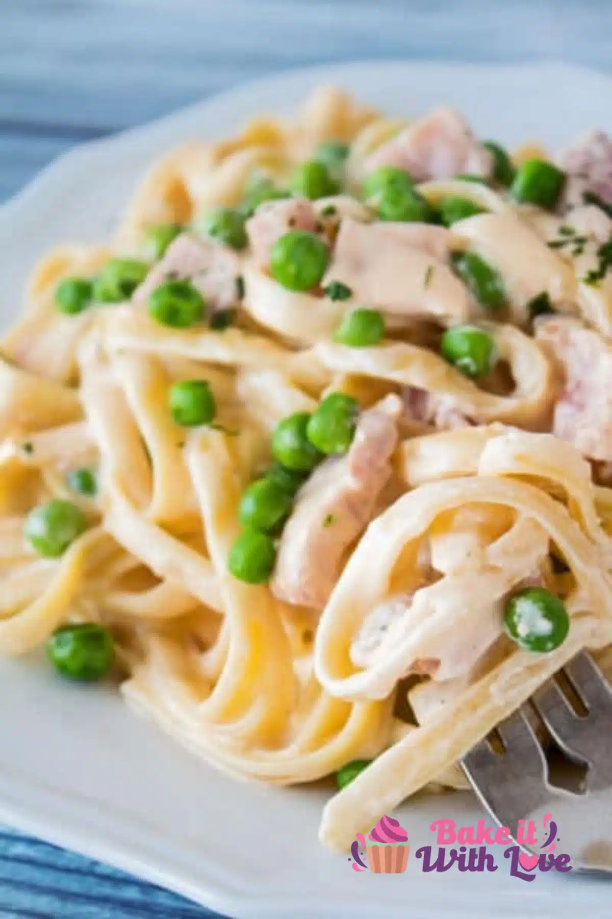 Tall image of ham and pea pasta.