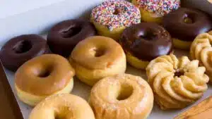 Wide image of donut varieties.