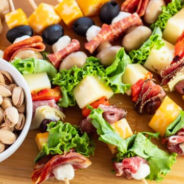 Wide close up image of antipasto skewer appetizers.