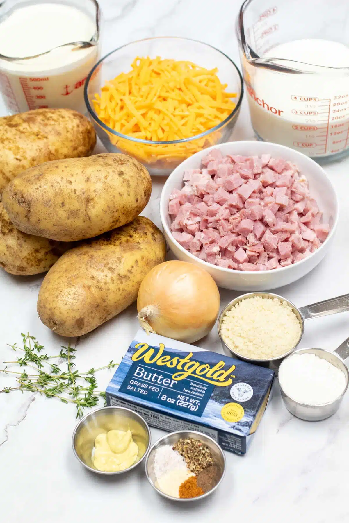 Tall image showing holiday ham casserole ingredients.